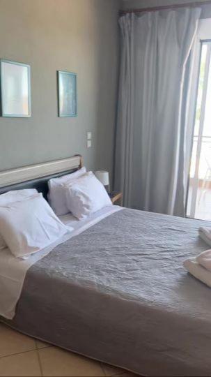 Glykanisos Mini Suites Néa Péramos Bagian luar foto